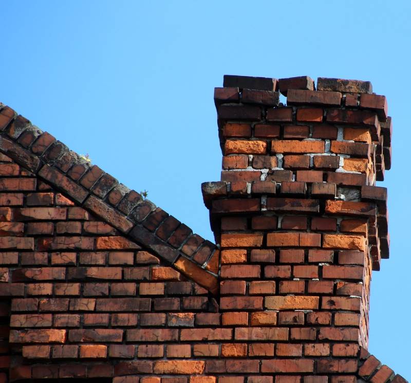 Signs Your Century City Home Needs a Chimney Inspection Damaged chimney on an Century City home showing cracks and missing mortar